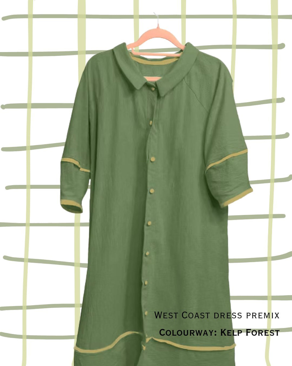 Close up of green dress with contrast green trim and buttons